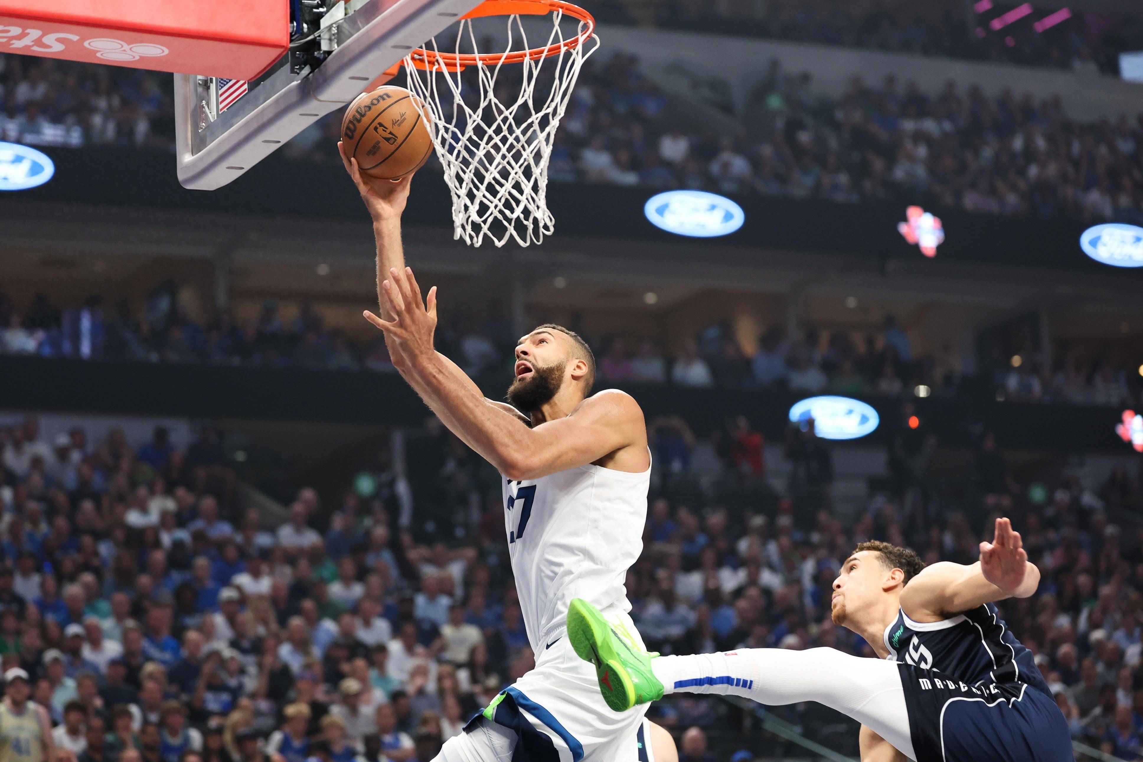 aoa体育课程-森林狼客场险胜独行侠